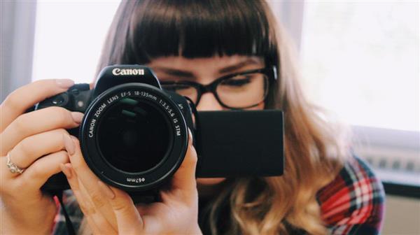 student using camera
